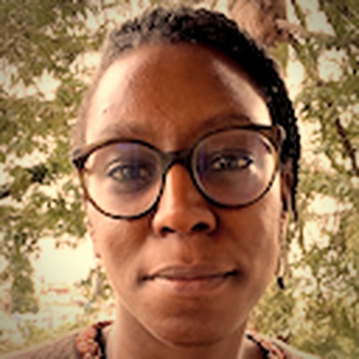 Aïcha Doucouré, She/Her